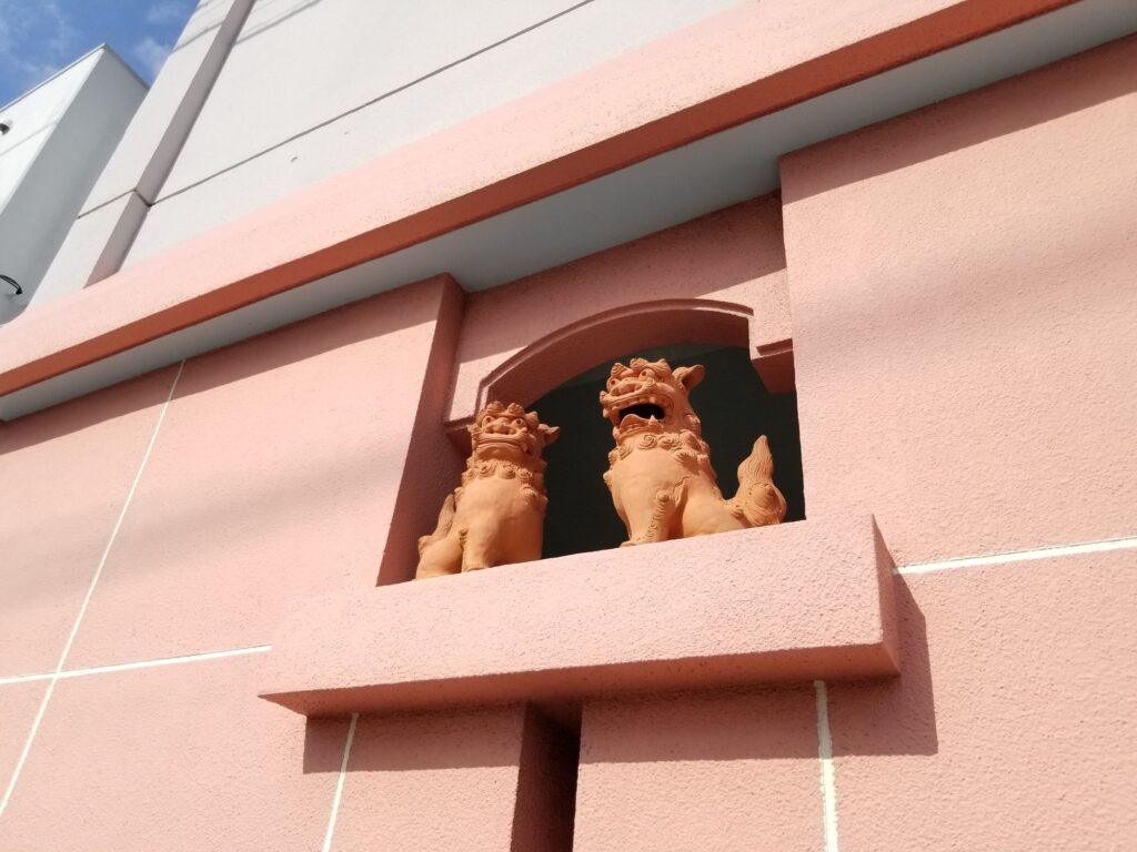 Pair of shisa guardian lions on a building in Naha